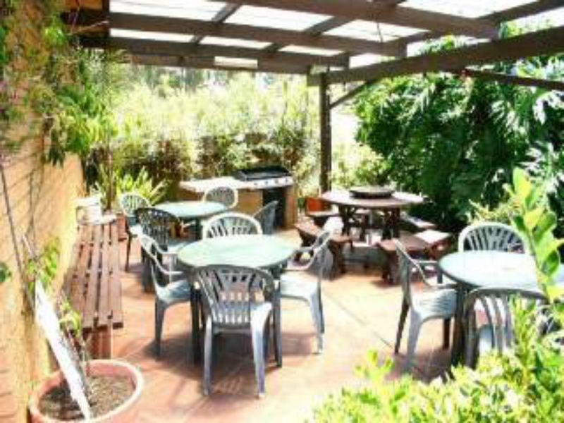 BBQ area with lake view and seating