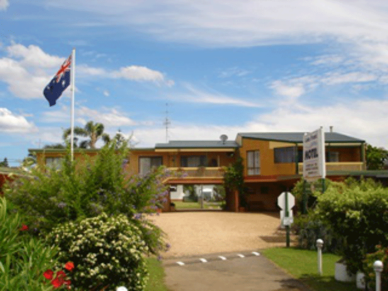 Lake Front Motel entrance with garden and lake view